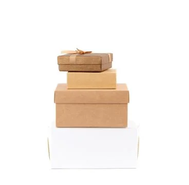 Stack of closed various cardboard boxes on a white background Foto stock