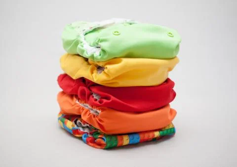 Stack of cloth diapers different colors Stock Photos