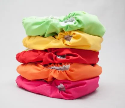 Stack of cloth diapers different colors Stock Photos