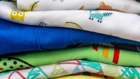 Stack of clothes as background Stock Photos