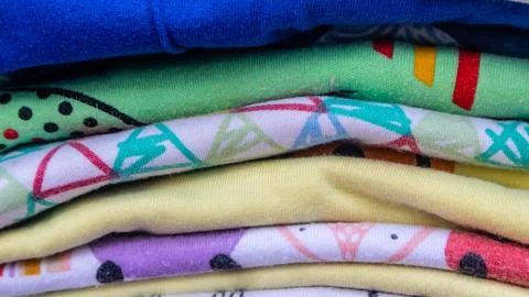 Stack of clothes as background Stock Photos
