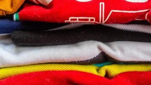 Stack of clothes as background Stock Photos