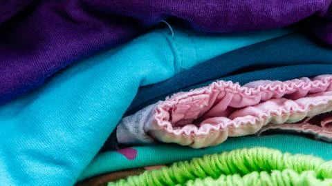 Stack of clothes as background Stock Photos