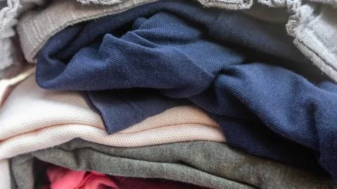 Stack of clothes as background Stock Photos