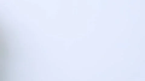 A stack of clothes in different colors. The concept of conscious clothing Stock Footage 236964108