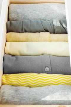 A stack of clothes in a drawer Stock Photos