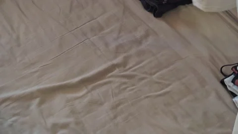 Stack clothing for sorting and baggage packing. Stock Footage 198599110