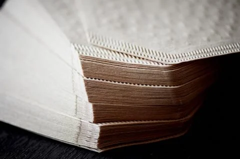 A stack of coffee filters made from Kraft paper.Macro 스톡 사진