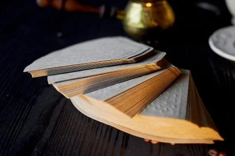 A stack of coffee filters made from Kraft paper.Macro 스톡 사진