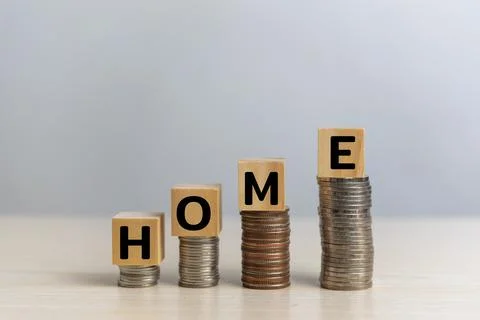 Stack coin and wood cube block text home business finance real estate and sav Stock Photos