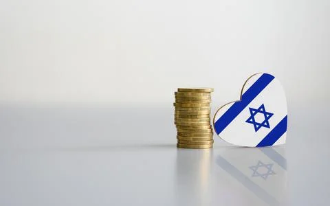 A stack of coins and the flag of Israel in the shape of a heart. Stock Photos