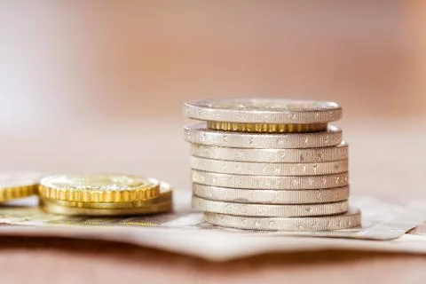 Stack of coins closeup Stock Photos