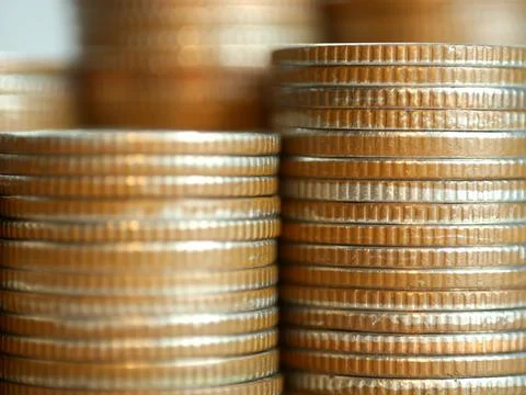 Stack of coins. In the concept of saving money and finance. Stock Photos