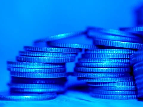 Stack of coins. In the concept of saving money and finance. Stock Photos
