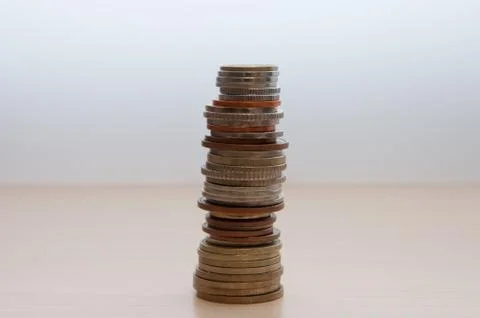 A stack of coins of different countries, different dignity, color and size on Stock Photos