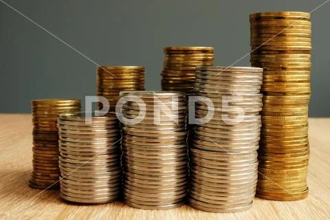 Stack of coins. Increase of wealth. Business success. Stock Photos