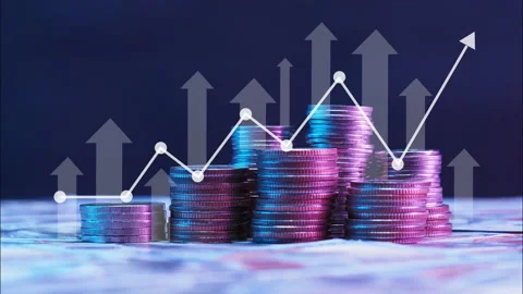 Stack of coins with increasing and decreasing trading chart Stock Footage 236296695