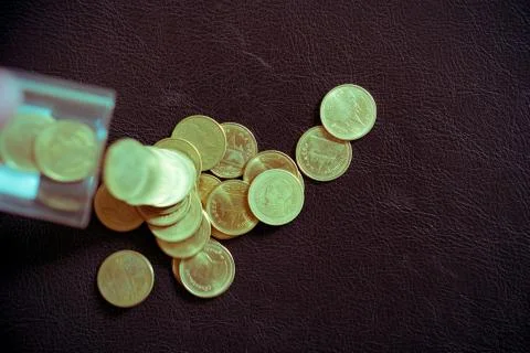 Stack coins isolated on black background Stock Photos