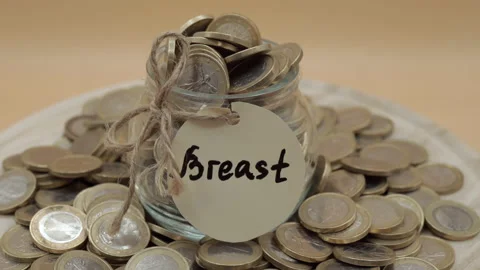 Stack of coins on isolated orange background, budget planning and earnings Stock Footage 151701847