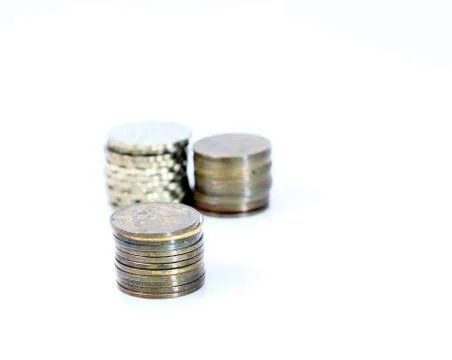 Stack of coins isolated on white background Stock Photos