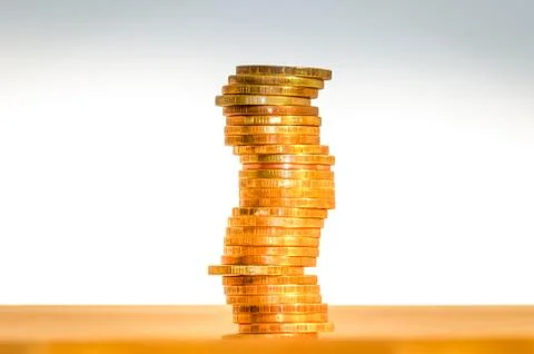 A stack of coins, isolated on white background Stock Photos