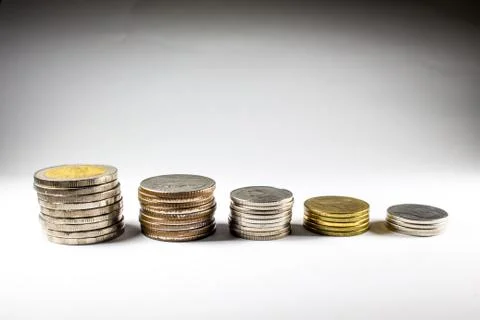 Stack of coins with the king. Stock Photos