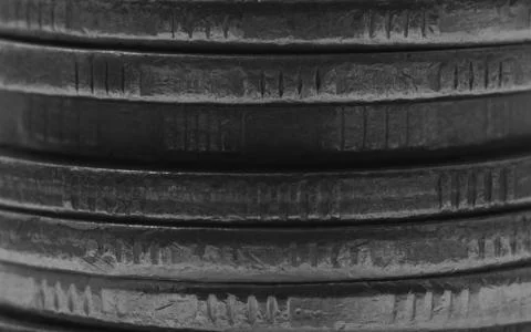 Stack of coins macro black and white abstract background 스톡 사진