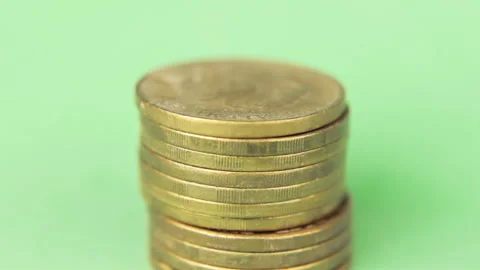 Stack Of Coins Multiplies Rising Up (Stop Motion) Video stock 105040064