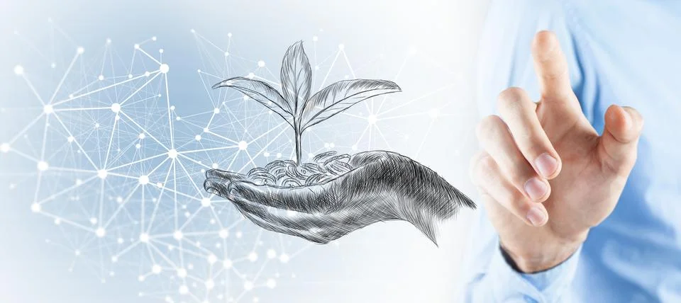 Stack of coins with plants representing growth Stock Photos