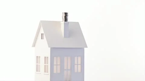 Stack of coins on a revolving home Stock Footage 30049763