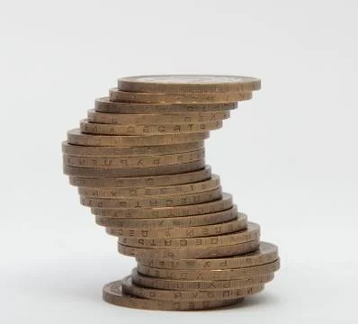 Stack of coins on white background Stock Photos