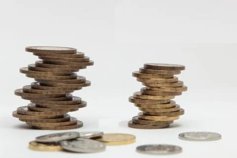 Stack of coins on white background Stock Photos