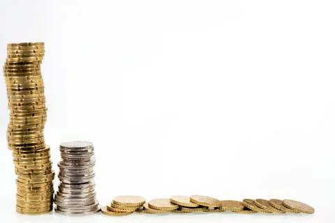 Stack of coins on white background. Stock Photos