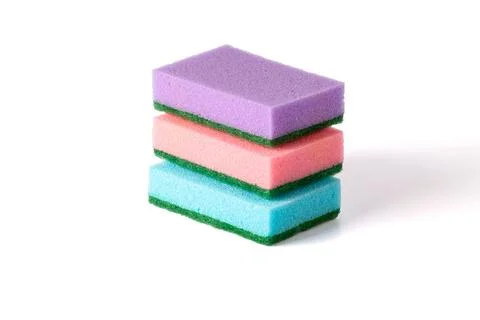A stack of colored kitchen sponges isolated against white background. Multi Stock Photos