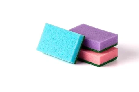 A stack of colored kitchen sponges isolated against white background. Multi-c Stock Photos