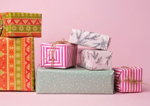 Stack of colored paper wrapped gift boxes. great design for any purposes Stock Photos