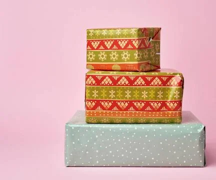 Stack of colored paper wrapped gift boxes stack of colored paper wrapped g... Stock Photos