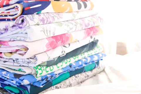 A stack of colored sheets on a white sheet Stock Photos