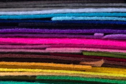 A stack of colorful acrylic felt. Multicolored macrophoto tissue Stock Photos