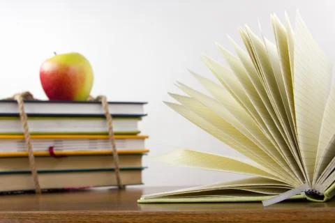 A stack of colorful books, open book Stock Photos