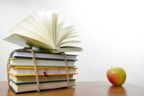 A stack of colorful books, open book Stock Photos