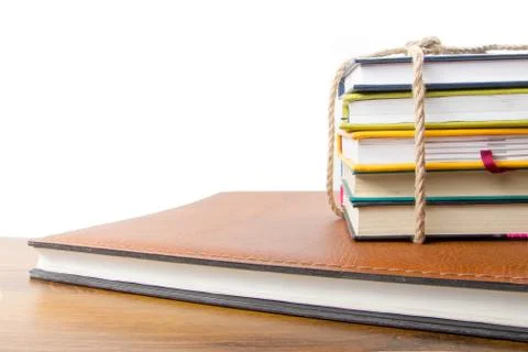 A stack of colorful books, open book Stock Photos