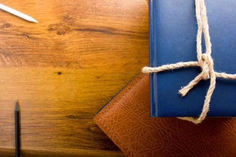 A stack of colorful books, open book Stock-Fotos