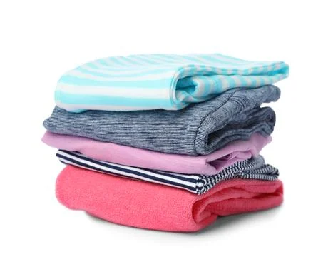 Stack of colorful children's clothes on white background Foto stock