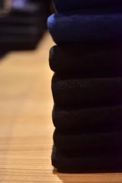 Stack of colorful clothes in a boutique Stock Photos