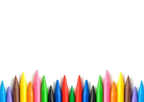 A stack of colorful crayons with copy space. Stock Photos