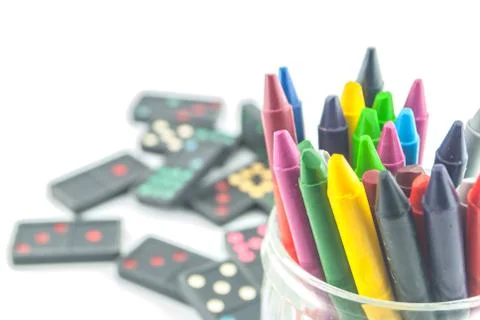 A stack of colorful crayons on an isolated white background Foto stock