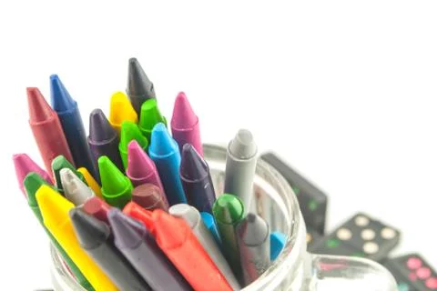 A stack of colorful crayons on an isolated white background Stock Photos