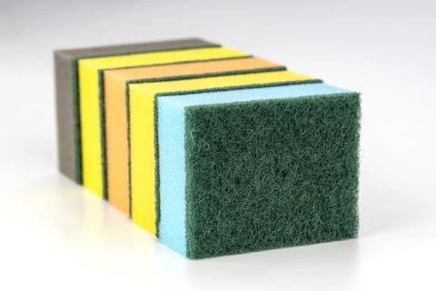 Stack of Colorful Kitchen Cleaning Sponges with Abrasive Scrubbing Surfaces Stock Photos