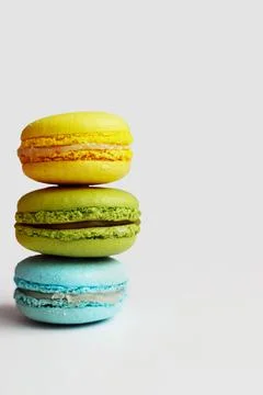 Stack of colorful macaroons on white background Stock Photos